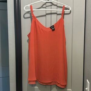 Torrid cami tank top size 2 which is a 18/20. Never worn. Color burnt orange.